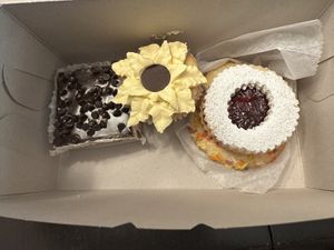 Caramel cheesecake bar, sunflower cupcake, linzer tart, and sprinkle cookie   at Pride Enjoy in Wading River