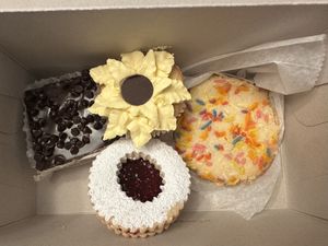 Caramel cheesecake bar, sunflower cupcake, linzer tart, and sprinkle cookie   at Pride Enjoy in Wading River