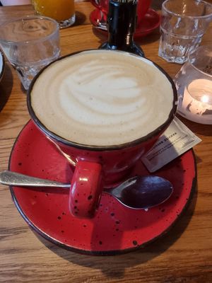 Oatmilk latte at Café Zehnsiebzig in Vienna