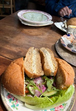 Saturday 6.7.24 visit. Advertised as (vegan) egg mayo sandwich but arrives as two cobs! And Mint pea soup at the back. at Tea by the Lock in York