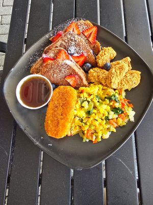 I think this was a breakfast sampler with strawberries and blueberries but they sure were stingy AF on those toppings that were extra $ at Burgeezy in Indianapolis