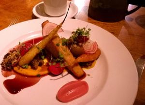 3rd course: Chickpea Cake with Morels.
This was amusingly plated on a triangle chickpea cake with earthly and succulent mushrooms and candystripe beets.

(Part of the amazing 'chef's table' 4-course meal which actually included 7 plates and tastes at Natural Selection in Portland