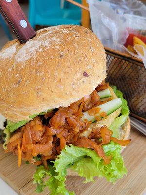 Vegilicious burger. Quinoa chickpea burger with sweet marinated carrot at El Veggie SV Escalón in San Salvador