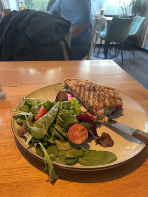 Bread with vegan goat cheese, red beets and salad  at Café Friedl in Vienna