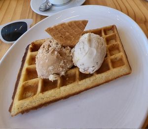 Belgian waffle with half and half (two scoops of ice cream of your choice). at ditto in Cape Town