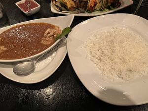 Fesenjan stew, basmati rice (no butter) and a side of grilled veggies (same as the veggie kabob)   at Pomegranate On Main in Greenville