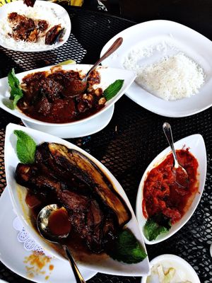 Portobellos w/pomegranate-walnut sauce, smoked eggplant dip, seared, braised eggplant w/basmati.  at Pomegranate On Main in Greenville