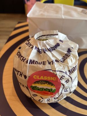 Burger (to-go) comes in interesting holder at Flower Burger in West Hollywood