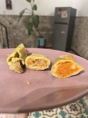 Chicharrón verde, potato chickpea, and spicy tinga   at Manik Bal in Merida