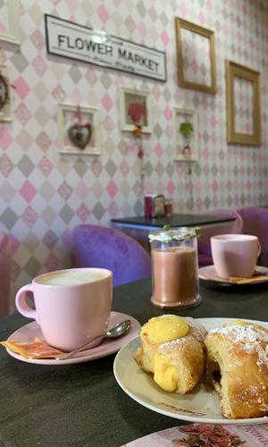 Cappuccino di soia, cornetto e bomba alla crema e pain au chocolat at MadamaDorè in Rome
