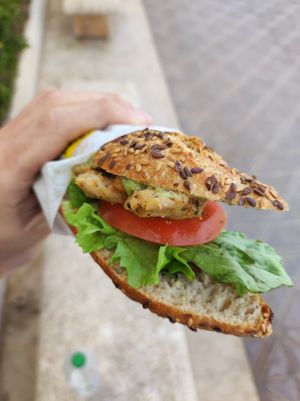 Salmon Guacamole (seeded bread with vegan smoked salmon, guacamole, tomato, lattuce, black sesame and vegan mustard sauce) at Pans & Company in Valencia