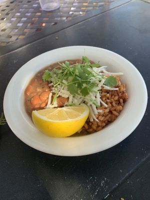 Beans and rice side with vegan cheesee  at Food for Thought Cafe in Joshua Tree