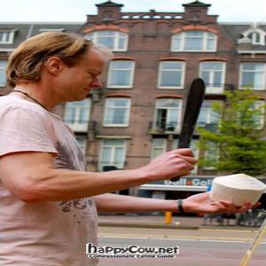 Young Green Coconuts, freshly opened at your table at Alchemist Garden in Amsterdam