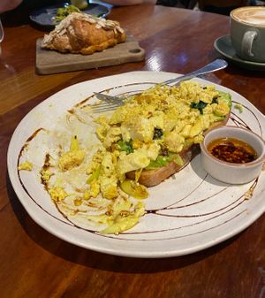 Vegan tofu scramble with avo on sourdough - buy the house chilli oil if you can!  at CAFE KIN in Nelson Bay