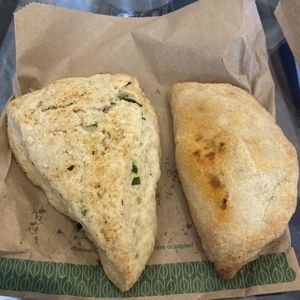 Savory spanakopita scone & samosa empanada  at Gallivant Coffee in Woodfin