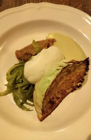 Grilled white kale, fennel and alga pesto salad, lemon foam, veggies sauce. at Matur og Drykkur in Reykjavik