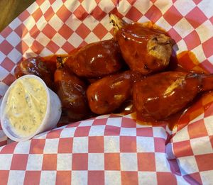 Spicy pineapple bbq drumsticks w/ ranch at Rudy's Pizza in Portland