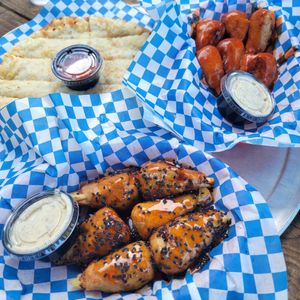 Orange Sesame Wings, Hot Pineapple Wings & Garlic Cheese Bread at Rudy's Pizza in Portland