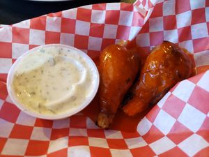 Two buffalo wings with a side of dill ranch, given to us complimentary after we told Rudy that we were Portland tourists. So delicious! at Rudy's Pizza in Portland