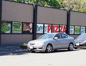 Exterior of Rudy's Pizza. at Rudy's Pizza in Portland