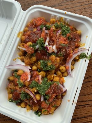 Chickpea curry with spring rolls & sauces  at Apna Punjab in Hitchin