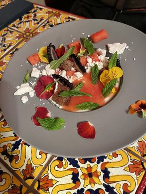 Complimentary from the chef! Flan with watermelon, churro cookies, berries, edible flowers, and some kind of magic crumbly sweet cheese.   at Etérea in New York City