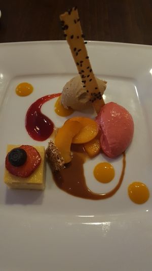 Cheesecake, raspberry mousse and coffee ice cream. at Lucky Leek in Berlin