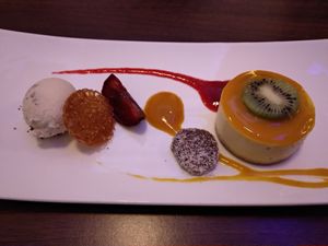 Mango cheesecake, praline and cookie ice cream. The texture of the cheesecake was on point! at Lucky Leek in Berlin