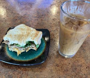 Forager breakfast sandwich and iced coffee with oat milk  at Uncommon in Essex Junction