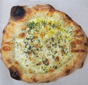 Bianca - garlic base, cheese (vegan available), with house Bianca herb blend.  at Off Center Patio & Pub in Hilliard