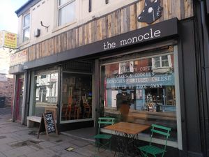 Storefront at The Monocle Cafe in Macclesfield