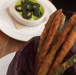 Stuffed mushrooms and fried green beans. Both are amazing. at Rise Above in St Catharines