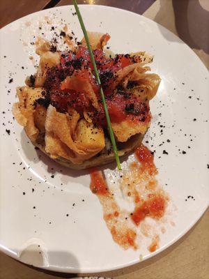 Deep fried crispy tofu on a bed of truffled mashed potatoes at Paprika in Granada