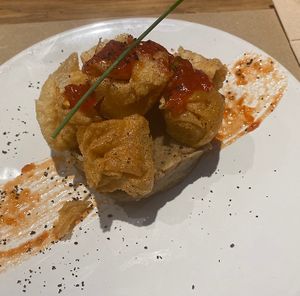 Crunchy tofu on mashed potatoes  at Paprika in Granada