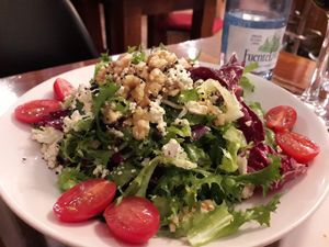 Salad with walnuts and ricotta sooo good but large portion for one! at Paprika in Granada