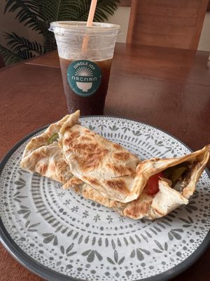 Manaish and stirred Petal & Leaves drink  at Arcana in Playa Del Carmen