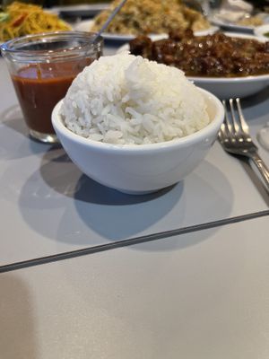 Steamed Rice comes with an entrée   at Asian Wok n Roll - Millcreek Dr in Mississauga