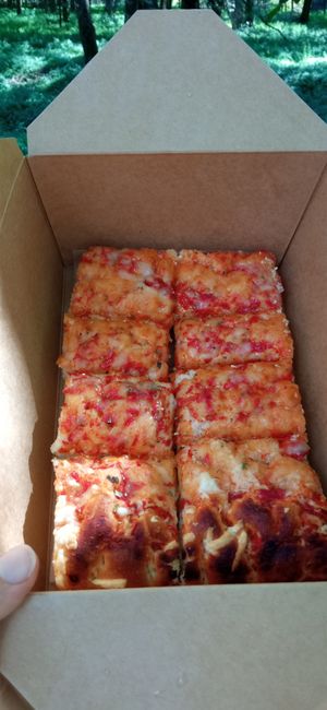 Trancio di pizza da asporto at River Oglio Bike Bar in Darfo Boario Terme