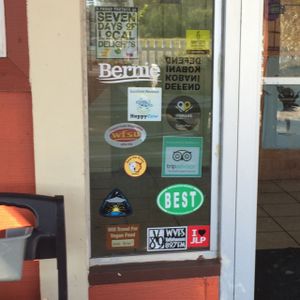 love the signs and what they stand for at Sweet Pea Cafe in Tallahassee