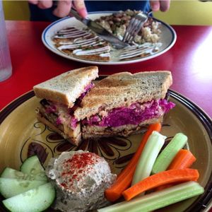 tempeh Reuben with veggies and hummus (and quesadilla in the background) at Sweet Pea Cafe in Tallahassee