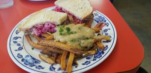 Tempeh Reuben & Poutine Fries $10.50 at Sweet Pea Cafe in Tallahassee