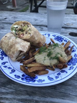 Falafawesome and poutine.  at Sweet Pea Cafe in Tallahassee