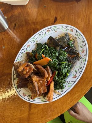 Buffet: crispy fish, pork belly, and sautéd greens  at The Vegan Shop in Hilo