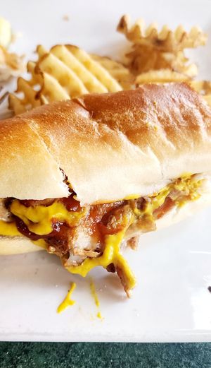 Plant based beef style steak with daiya cheese at Appetites On Main in Exton