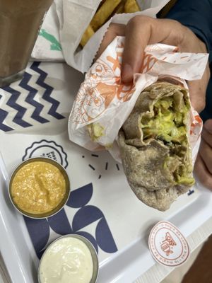 Burrito estelar (con mayonesa de almendras y ají de la casa)  at Holy Plants in Lima