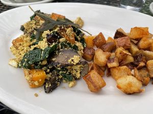 Butternut squash, kale, & mushroom scramble made vegan. This is their fall/winter scramble   at Cafe Flora in Seattle
