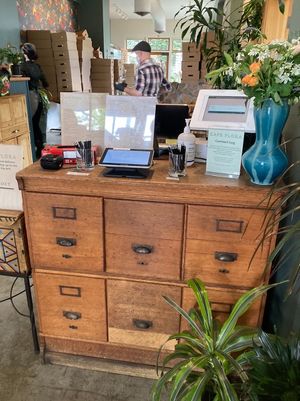 Check-in counter at Cafe Flora in Seattle