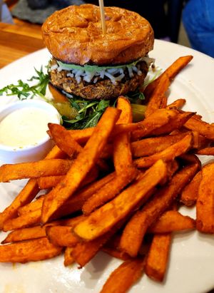 Italian Burger with added vegan mozzarella and avocado at Cafe Flora in Seattle