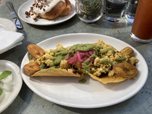 Tortilla shell, tofu, black beans, and plantains. Plantains we’re a bit plain but on the whole the dish was delicious.   at Cafe Flora in Seattle