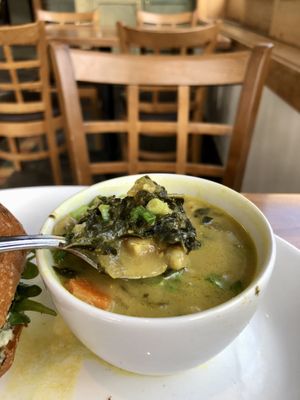 Coconut curry base with chickpeas and kale  at Cafe Flora in Seattle
